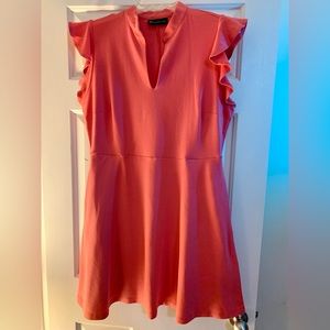 Knit cotton NY&C flare dress with pockets in color Pink Rouge.